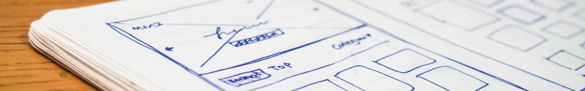 A sketch pad with wire-frames for a website design